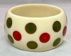 SH86 Shultz bakelite dots on cream lucite bangle